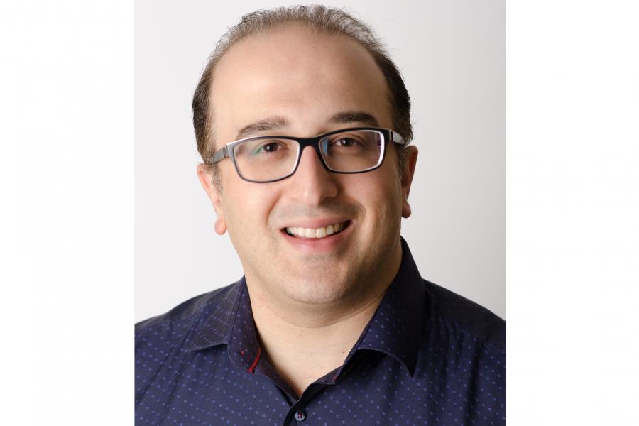 smiling and posing for the camera